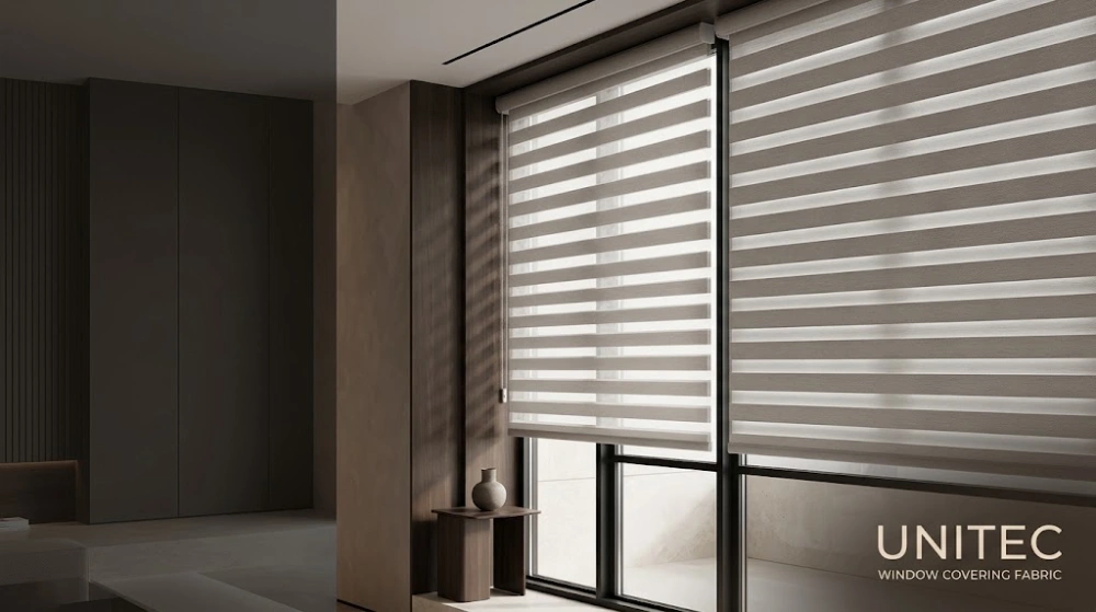 UNITEC zebra blind fabric in a contemporary interior, showing its alternating sheer and opaque horizontal bands